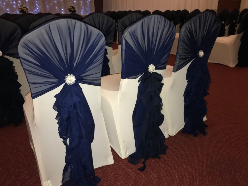 Ruffle Hoods with Silver Brooches