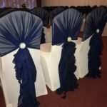 Ruffle Hoods with Silver Brooches