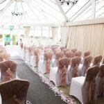 Ruffle Hoods with Silver Brooches
