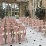 Vertical Chiffon Drapes with Silver Brooches
