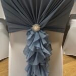 Ruffle Hood with Silver Brooch