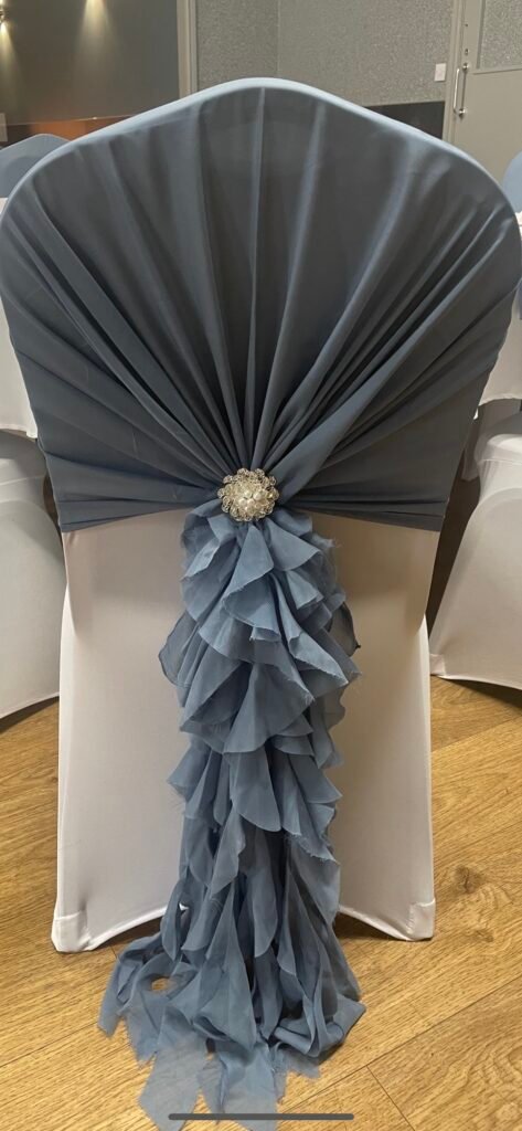 Ruffle Hood with Silver Brooch
